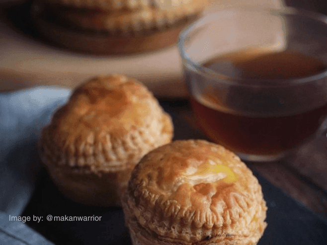 Close-up of mini Chicken Pie with cup of tea served at York Hotel Singapore