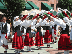 A group of women dancing Basque Block near Hotel 43