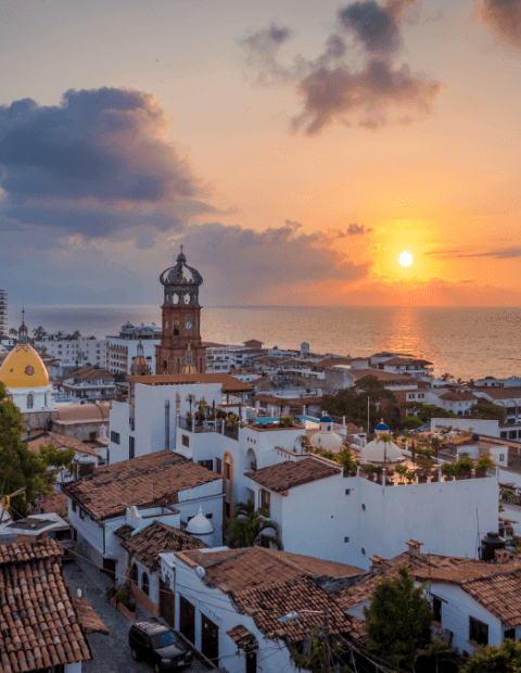 Sunset view of Puerto Vallarta city near Plaza Pelicanos Grand Beach Resort