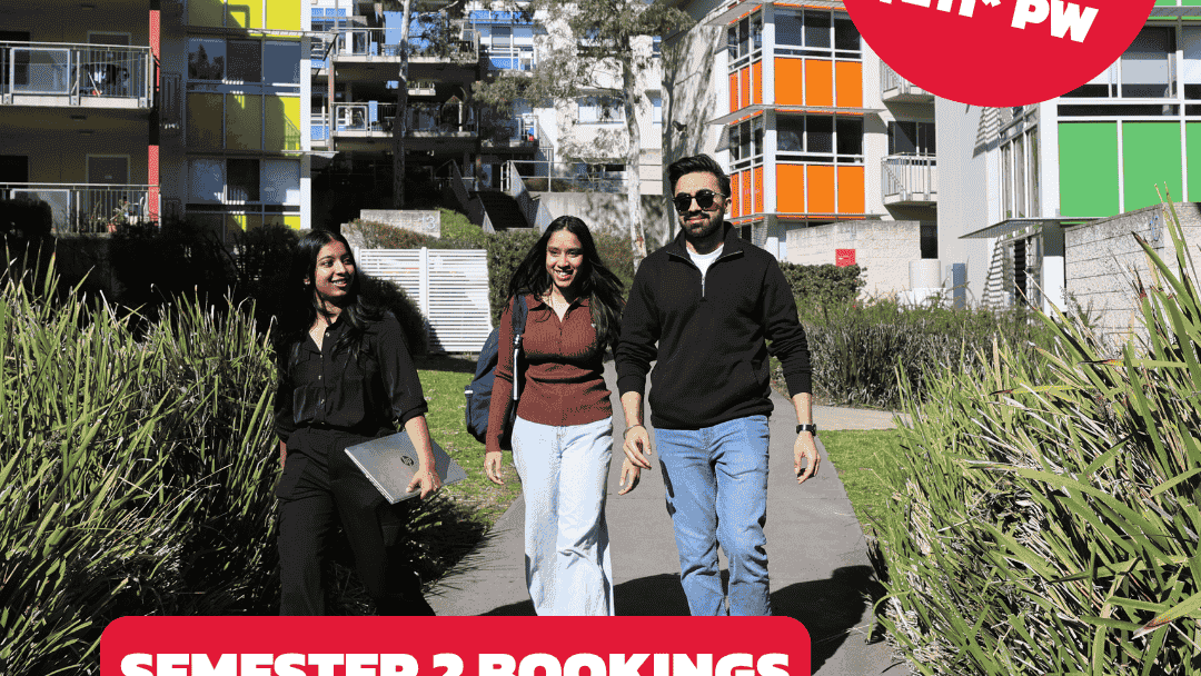 Three people walk on a path past a modern building advertising Semester 2 bookings at UniLodge @ UC - Campus West.