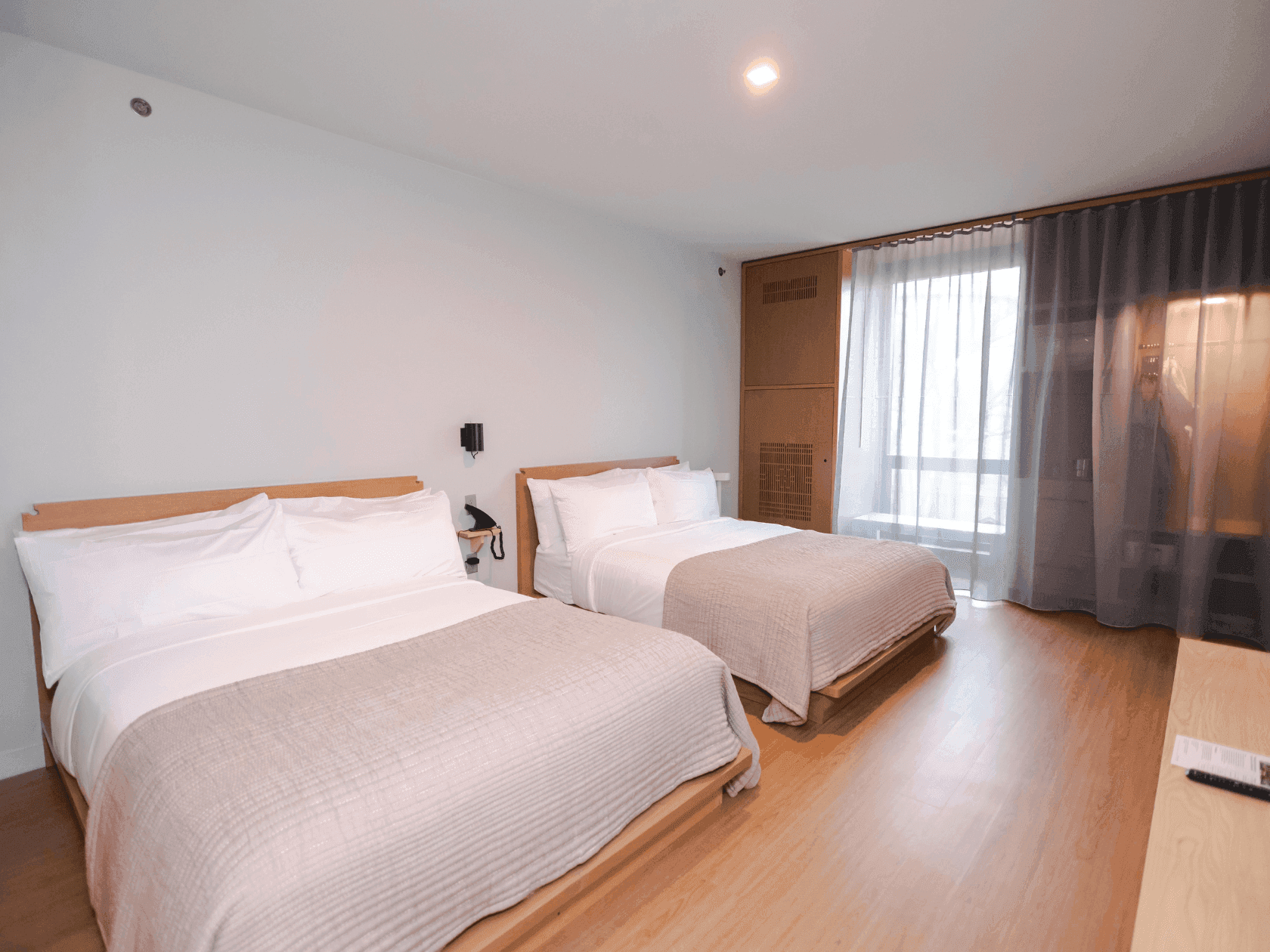 Premium Double Queen Bed with a view of the courtyard at The Stonebreaker Hotel