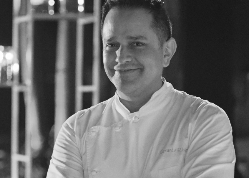 Closeup black & white portrait of chef at Fiesta Americana