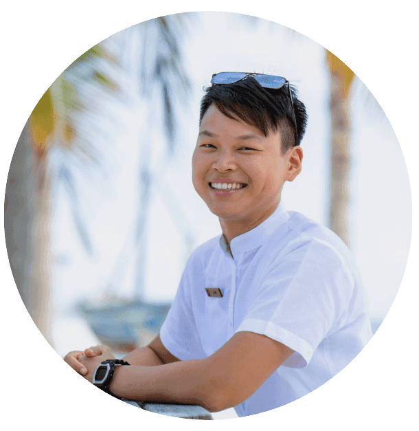 Joey Pon, Assistant Front Office Manager at Grand Park Kodhipparu, Maldives, smiling in a professional setting