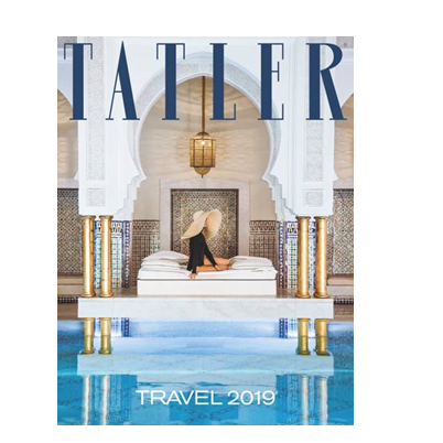A magazine cover of Tatler at Rome Luxury Suites