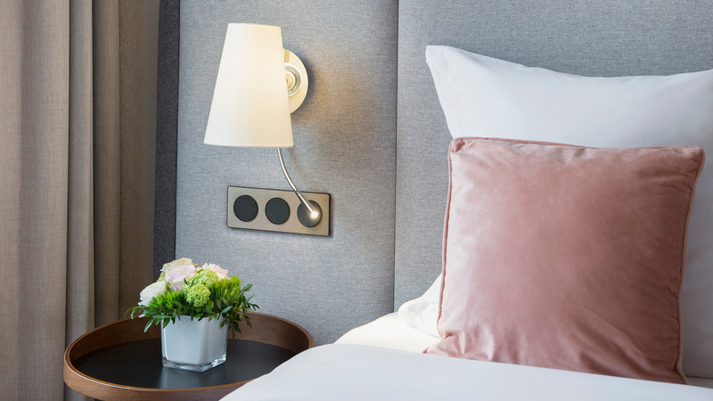 Close-up of bed in Deluxe Room at Warwick Reine Astrid - Lyon