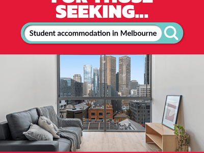 City skyline through large windows in a modern living room at Student Living on Lonsdale.
