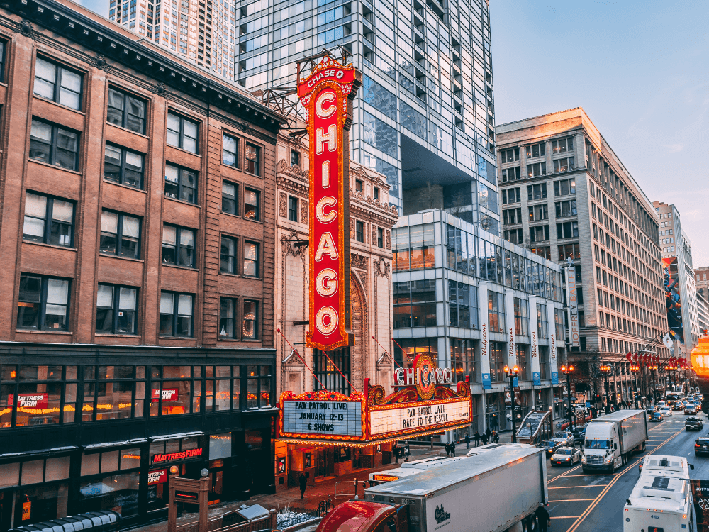 Chicago Theater street view with cars driving up and down the street