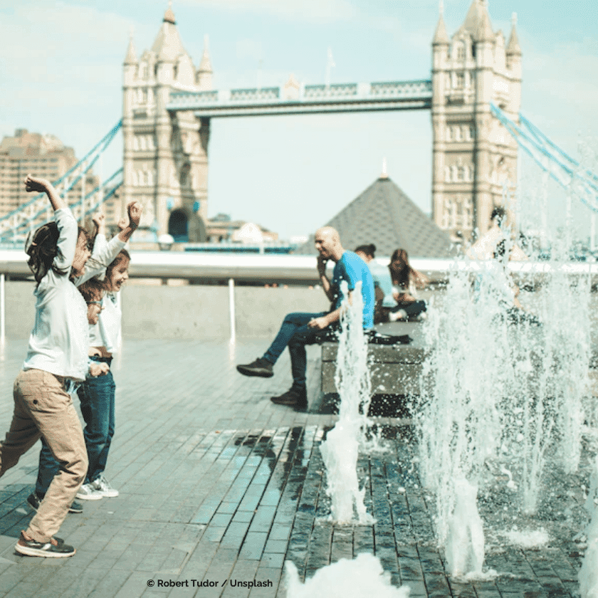 Children playing in front of the Tower Bridge