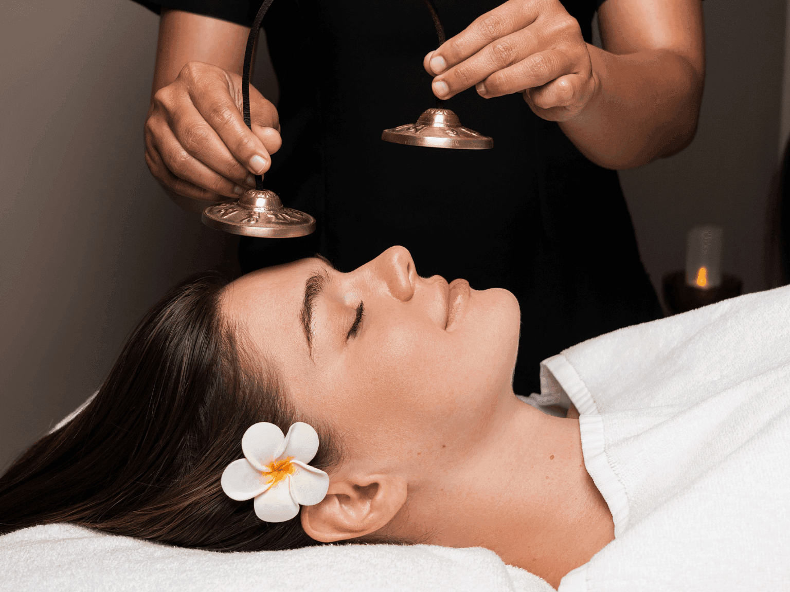 Holistic facial ritual with calming ambiance and natural healing touch in Dreamworks Spa at DAMAC Maison Distinction