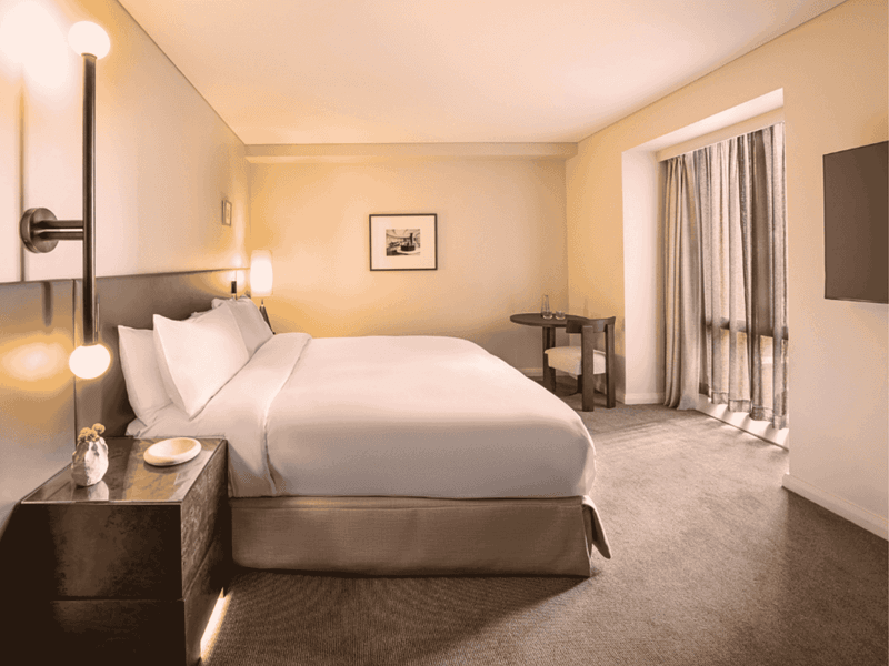 Classic Room with Special Access featuring a Sofitel MY BED, modern lighting, and neutral tones at Sofitel Sydney Wentworth