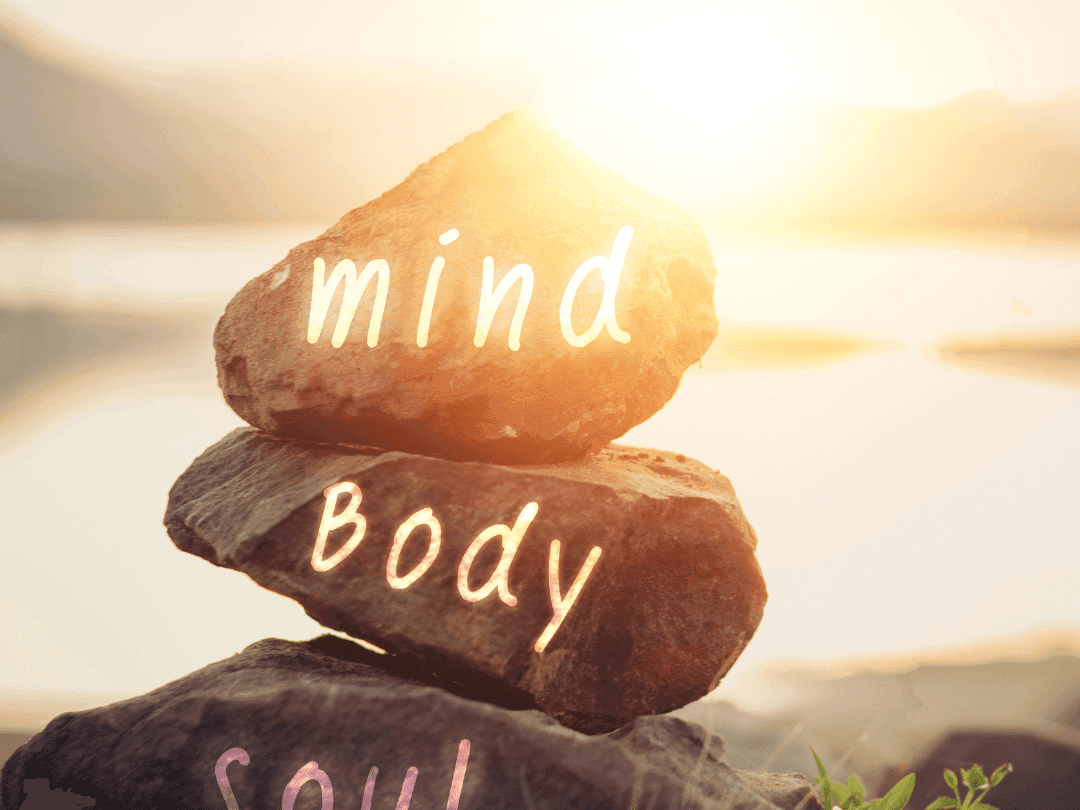 Mind, Body, Soul engraved on rocks in the beach near Golf Hotel Punta Ala
