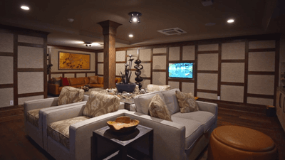 Lounge room interior with sofas & cushions at The Abbey Inn