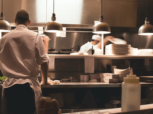 Chefs prepare meals in the Kitchen at Hotel Mont Gabriel Resort