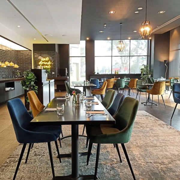 Dining tables in Meze Restaurant & Bar at Novotel Glen Waverley