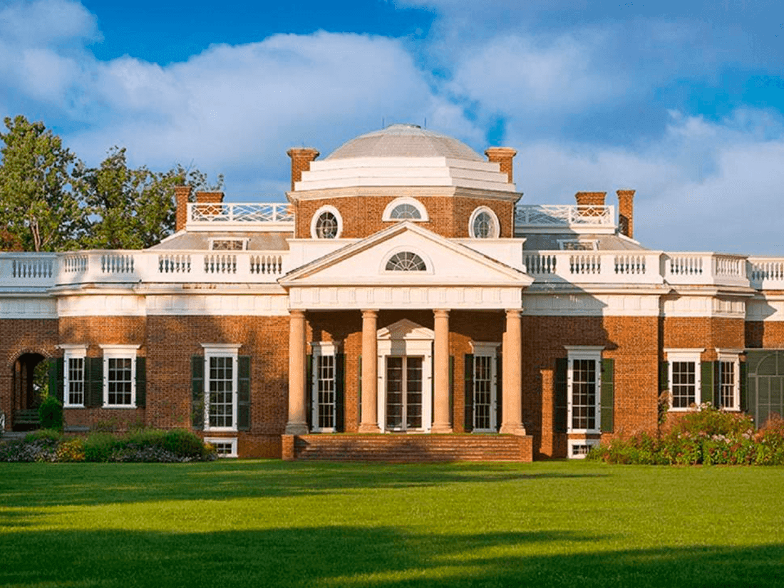 Exterior view of Monticello with green lawn near Inn at Willow Grove