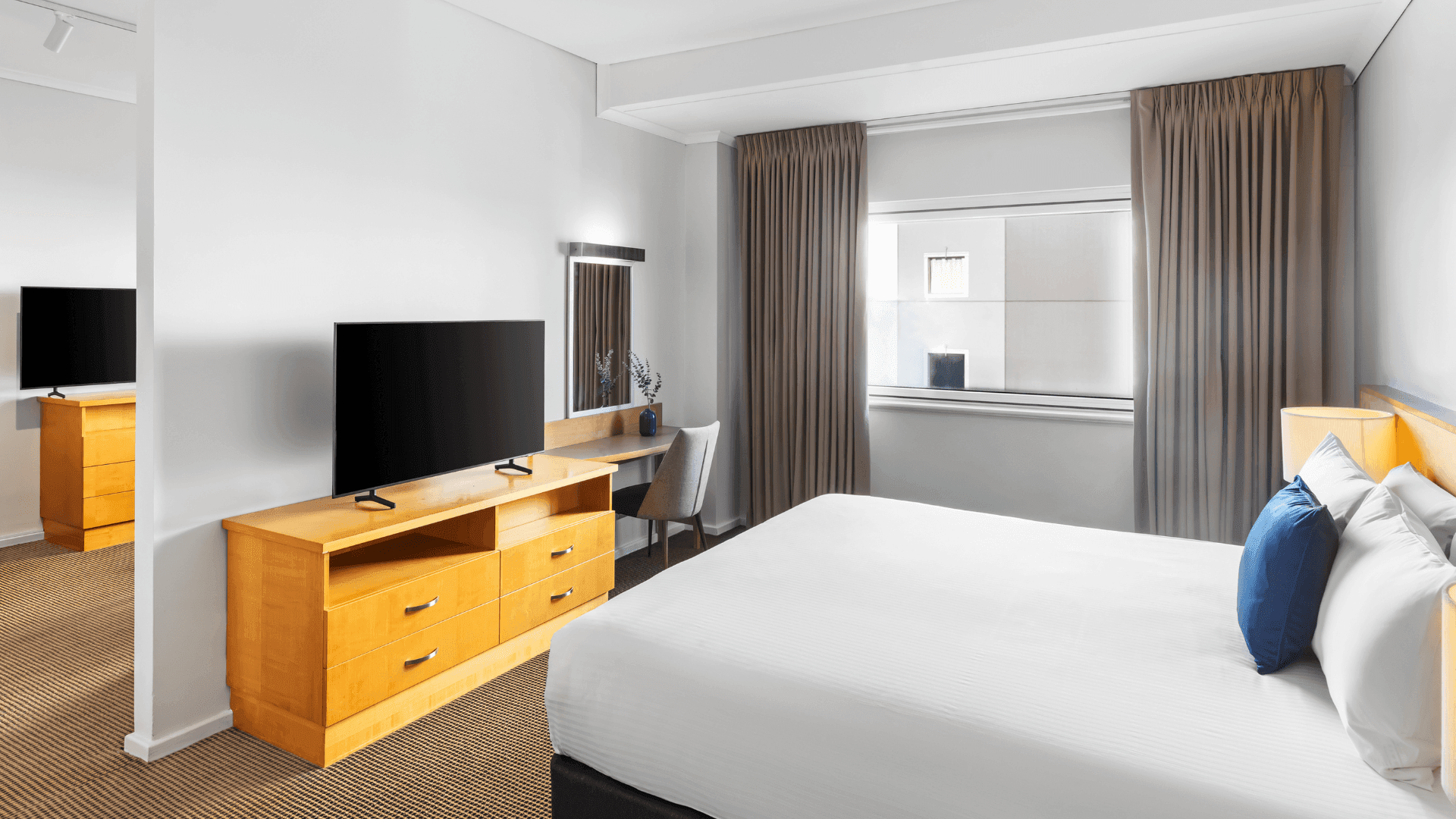 Bedroom separate with living room in Executive Suite