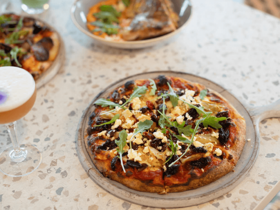 Pizza & cocktails served in Shallows Bar at Pullman Magenta Shores