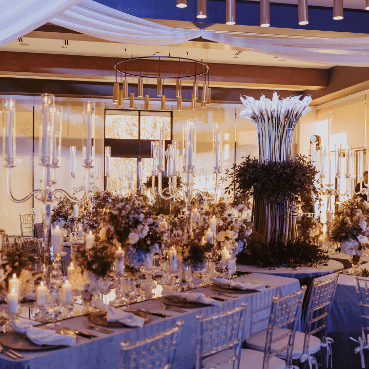 Interior shot of Bride and Groom table with sunset in background