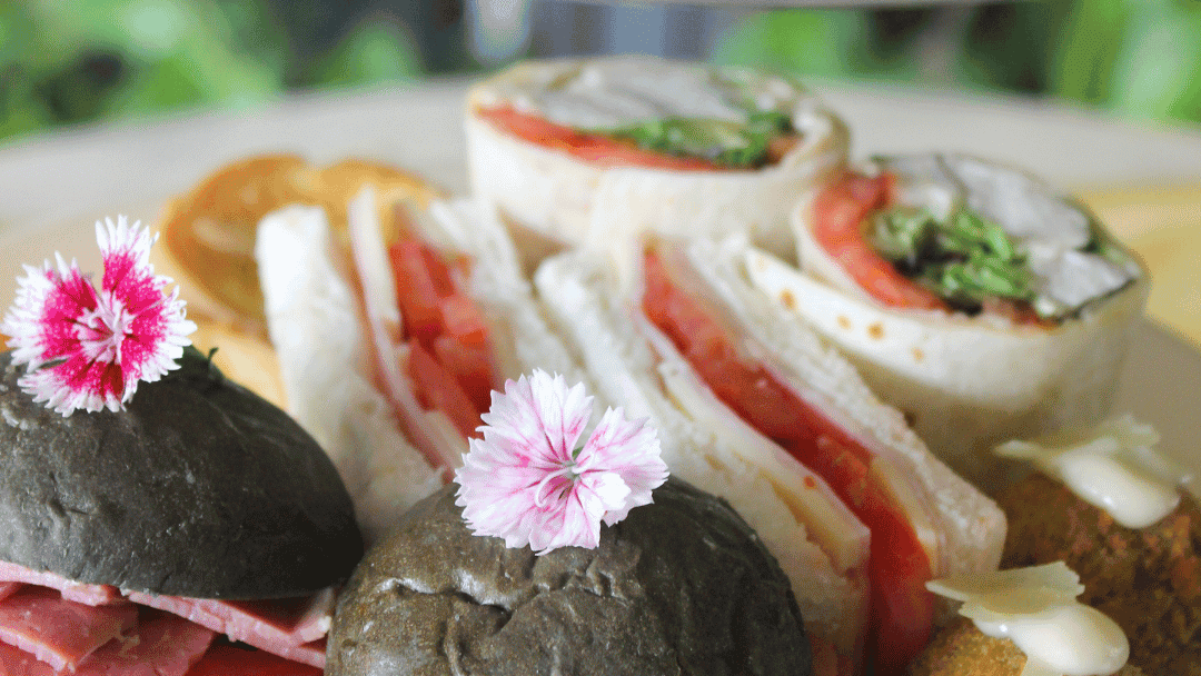 Assorted Mother's Day High Tea dishes on a two-tier stand.