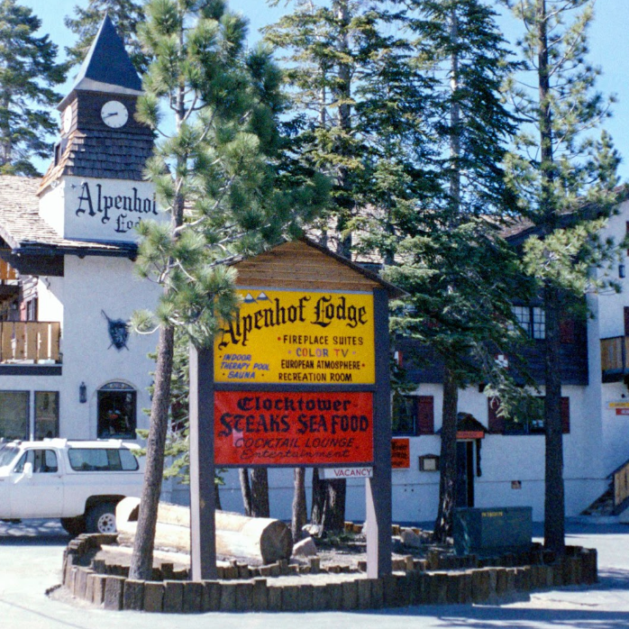 The hotel exterior & sign board of Alpenhof Lodge