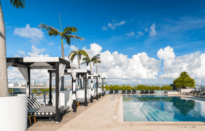 Daybeds by the outdoor pool at Boulan South Beach