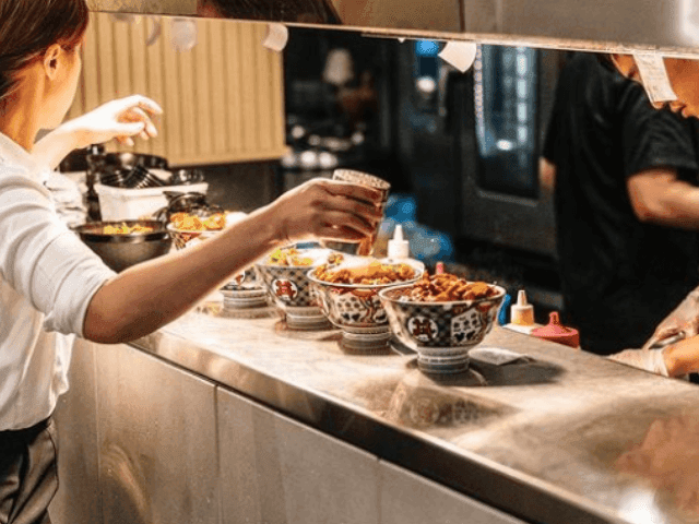 Chefs working in the Superhiro kitchen at Brady Hotels Central Melbourne