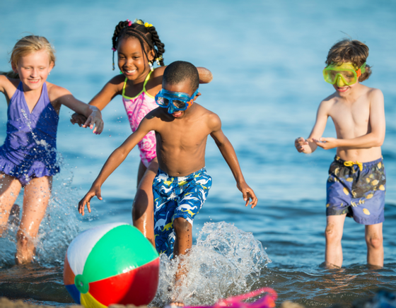 Kids play in the water near our Diamond Beach, NJ, hotel