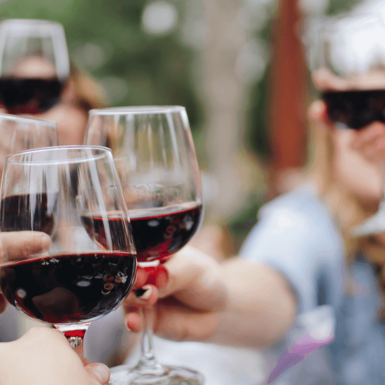 clinking wine glasses