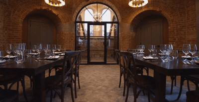 Table arrangements in a dining hall at The Abbey Inn