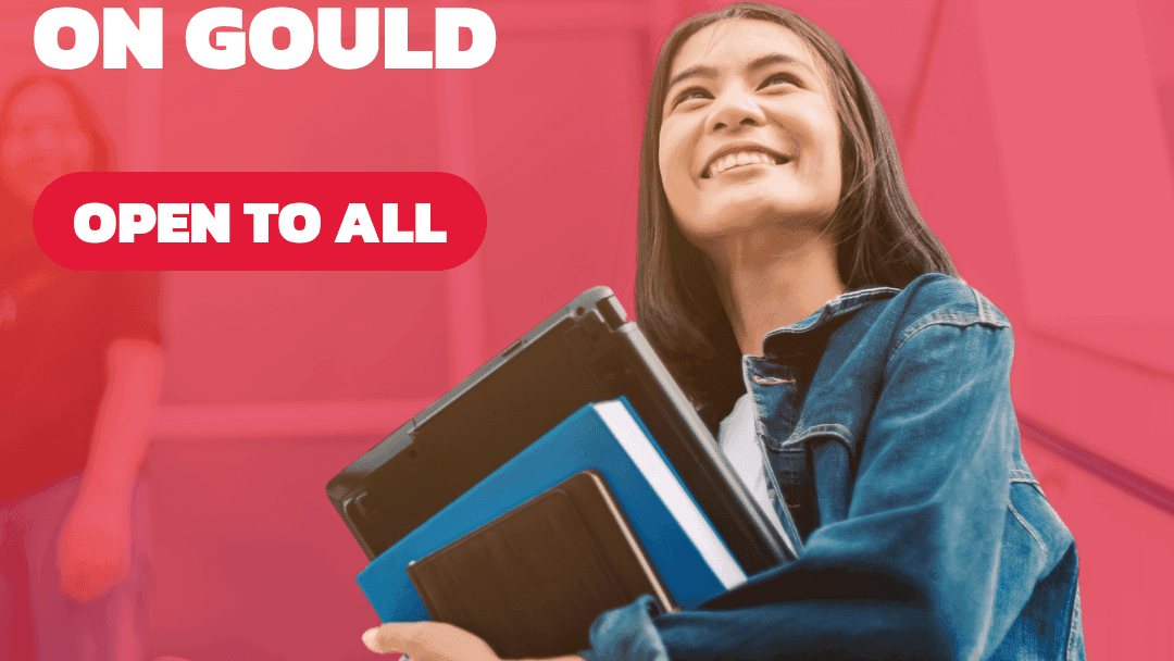 Smiling student holding books with text we're now student living on Gould open to all.