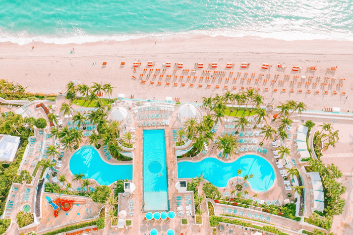 An aerial view of The Diplomat Resort pool area & the beach 
