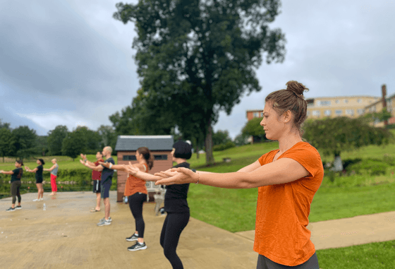 People engaged in outdoor exercising near Honor's Haven Retreat