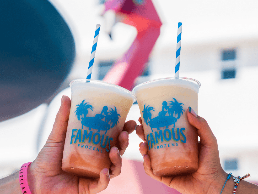 Toasting ice coffee cups at Clevelander South Beach