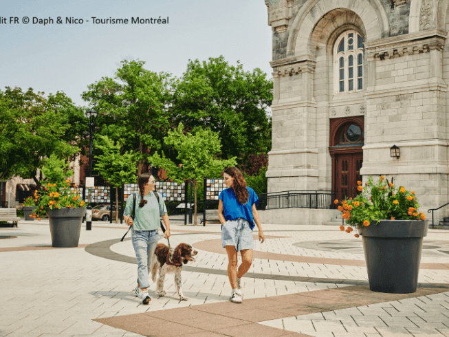 two_ladies_walking_their_dog_in_downtown_montreal