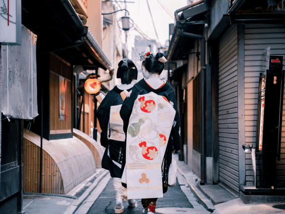 Two persons in kimono walking down a Pontocho Alley near Park Hotel Kyoto