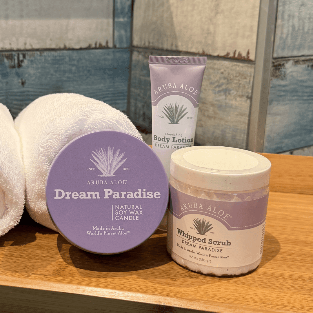 Aruba Aloe wax candle, body lotion, and whipped scrub