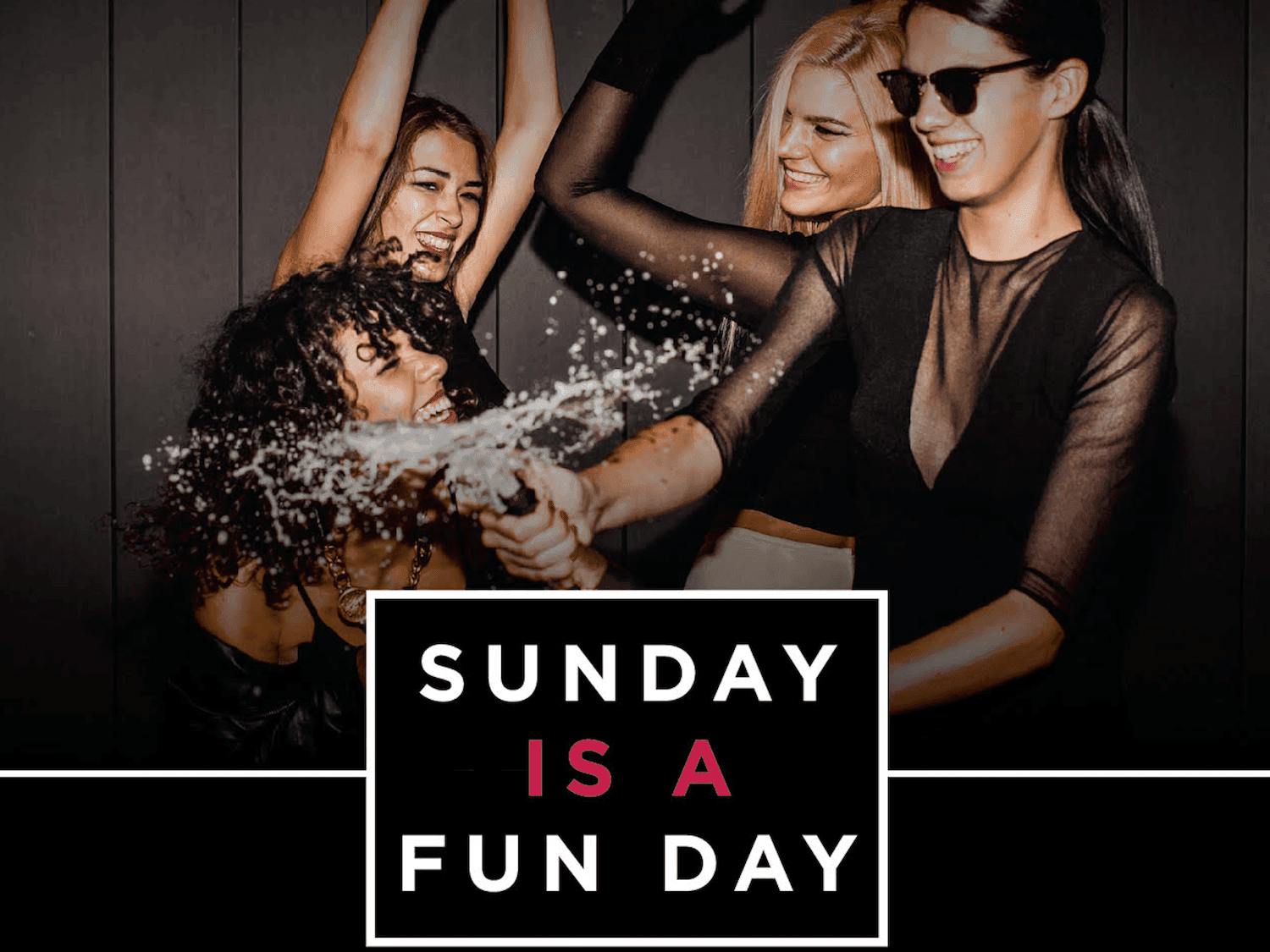 Girls spraying champagne for Sunday Funday