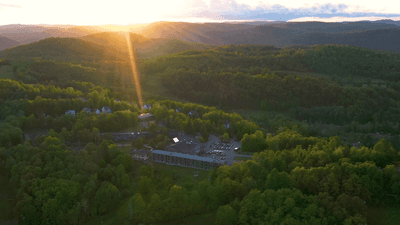 Aerial sunset view of Hotel Mont Gabriel Resort & Spa