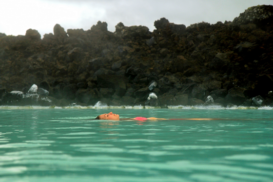 a woman relaxing in water