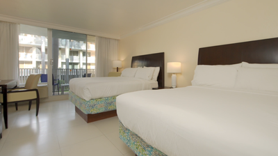 Comfy beds in a Standard Room at Holiday Inn Montego Bay