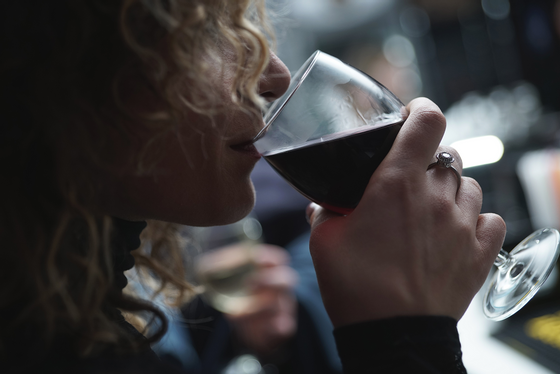 a woman drinking wine