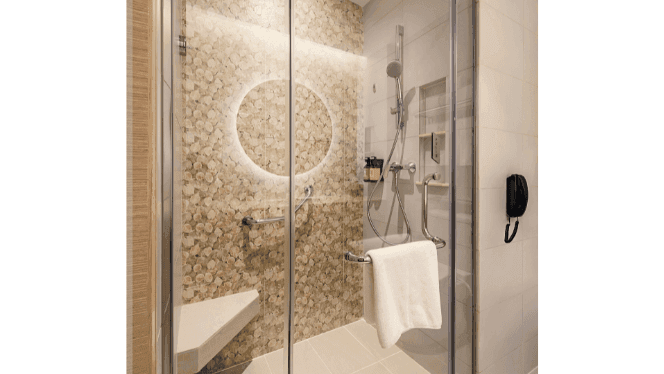 Bathroom with a bathtub in Deluxe Room at Sunway Hotel Phnom Penh