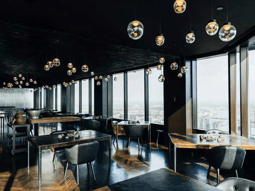 Inside the restaurant with high rise city view