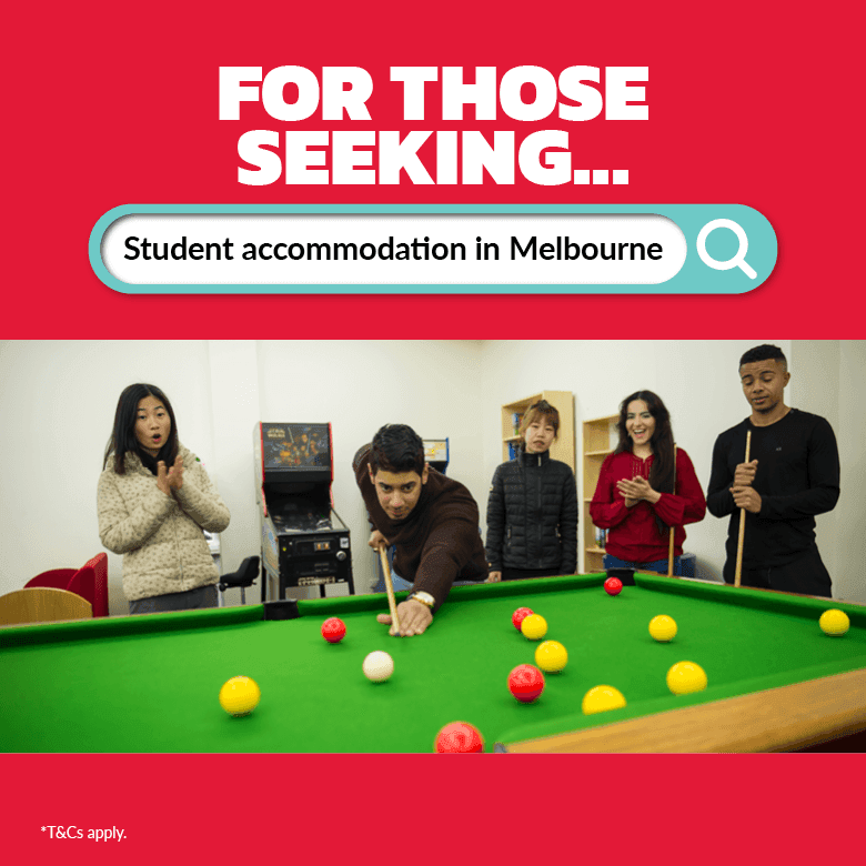 Group of people playing pool in a common room at Student Living - 590 Lygon.