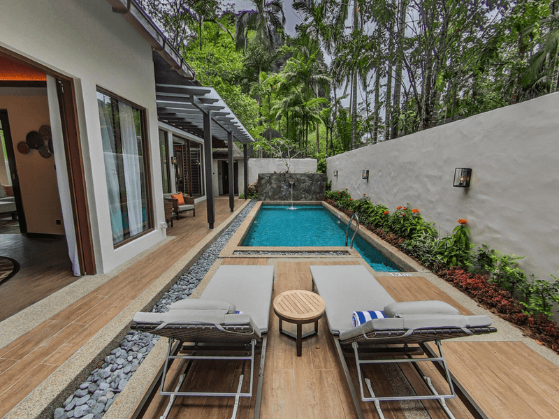 Sunbeds by the private pool area at The Banjaran Hotsprings Retreat