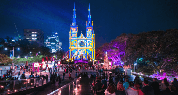 St. Mary's Cathedral illuminated by the Lights of Christmas light projection in Sydney.