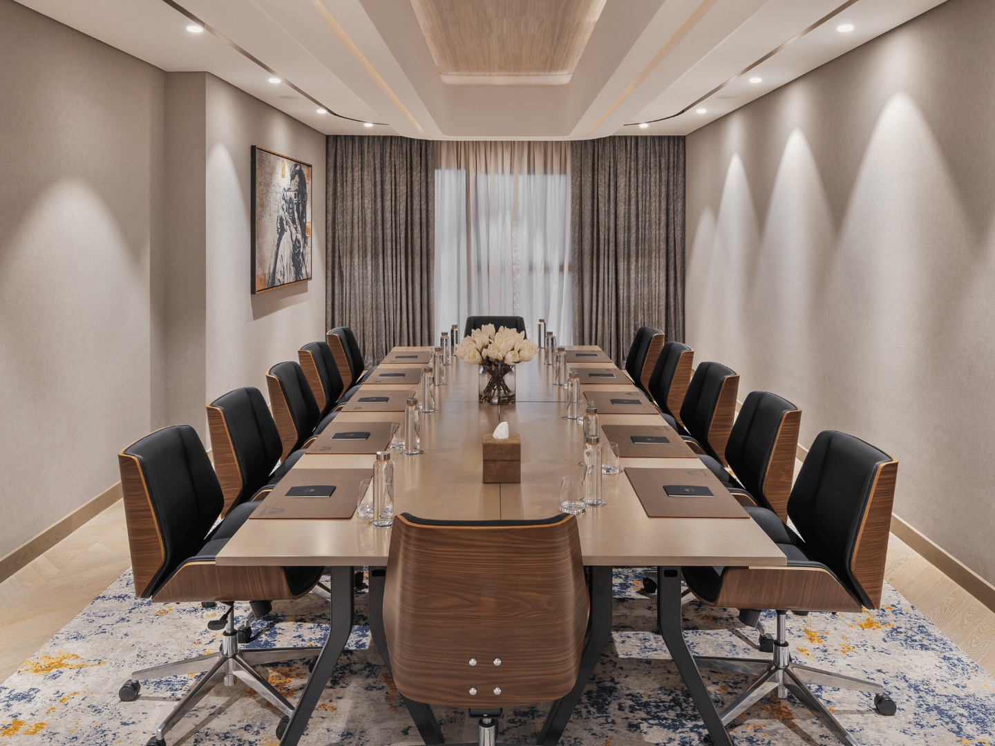 Conference room with a long table and chairs in Business Studio 2 at Paramount Hotel Midtown