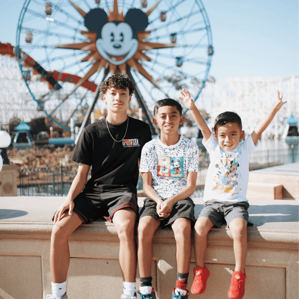 Family in Front of Ferris Wheel
