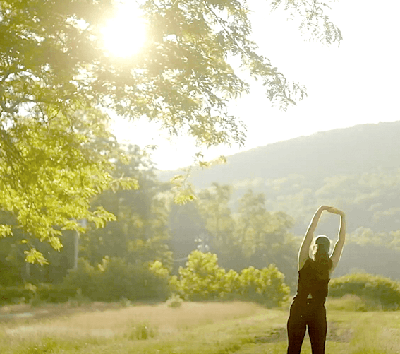 Lady doing Yoga at Honor’s Haven Retreat