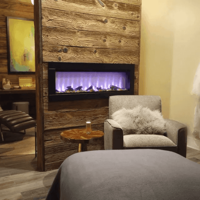 Fireplace and plush couch in Inn at Willow Grove